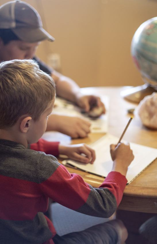 Children working independently at a homeschool table